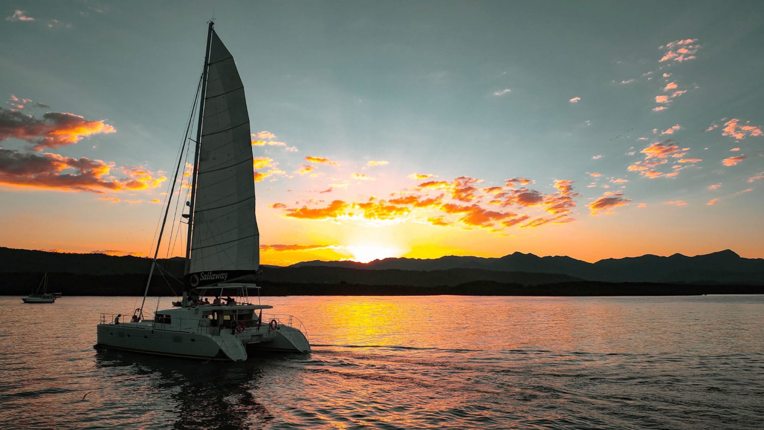 pacific northwest sunset sailing cruise